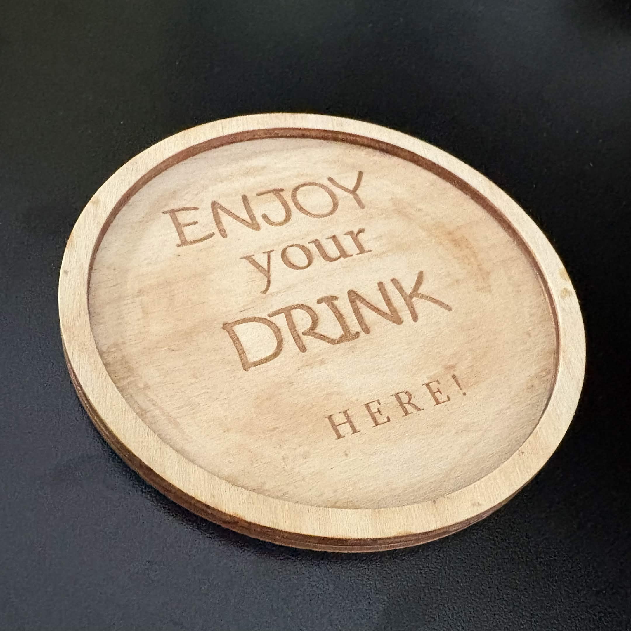 A wooden cup coaster that I made it using a laser cutting machine in grade 10. I also design it myself using Fusion 360. Very proud of this one.
